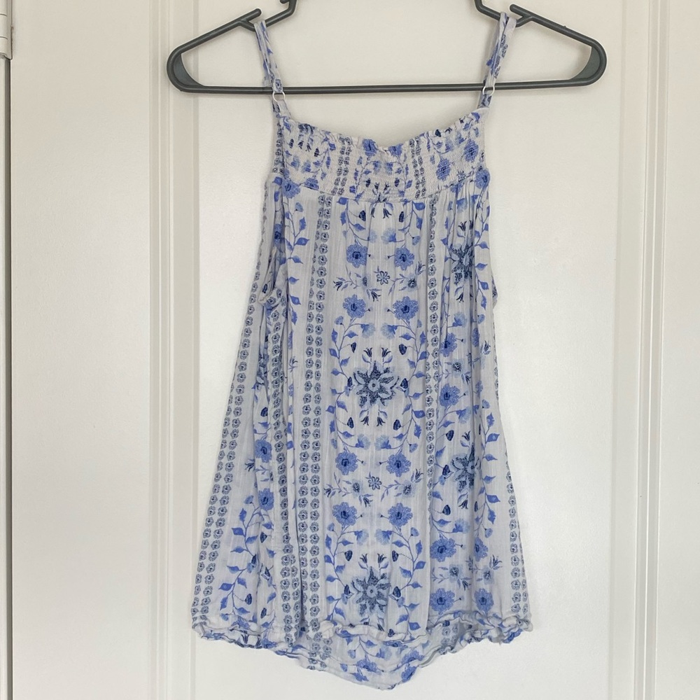 White and blue floral shirt